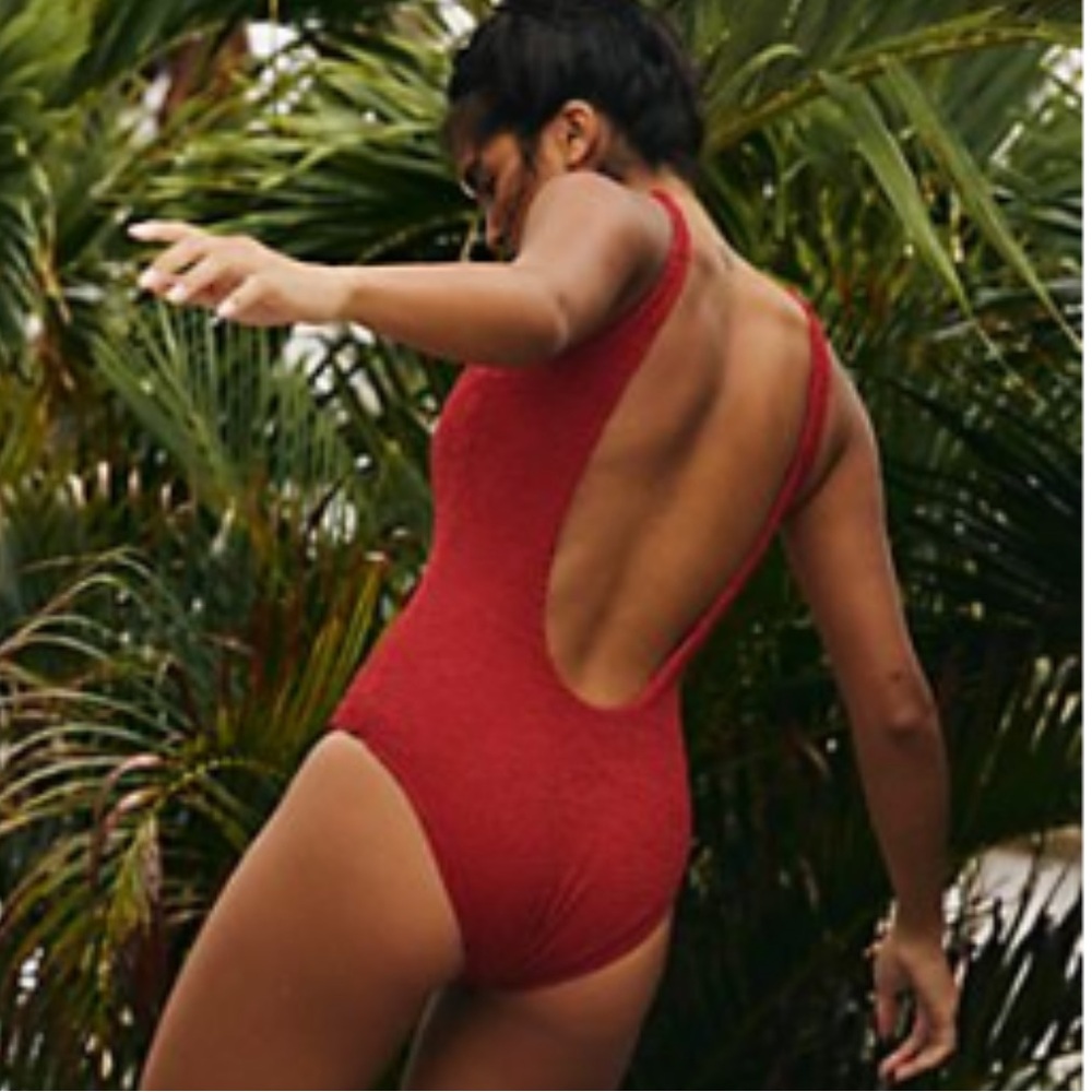 Free People The backless one piece swimsuit. Size M color chili NWT. Sold out